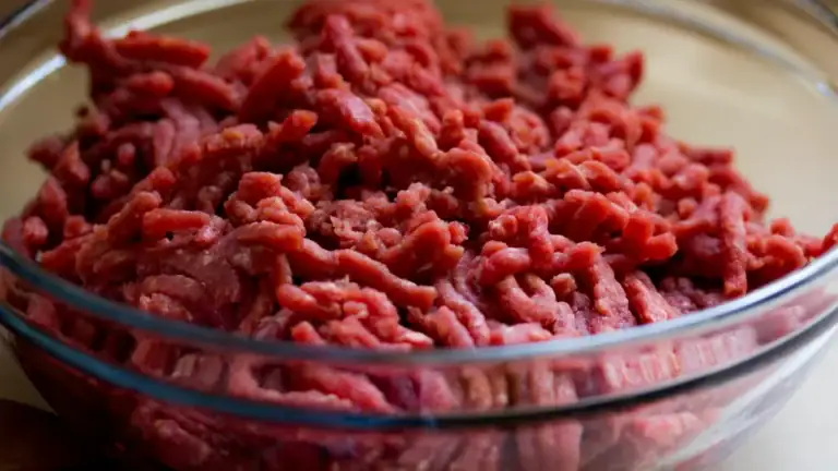 Carnivore Diet: How it works, Food List, Benefits, Risks, and More 1 A close up of raw ground beef in a bowl.